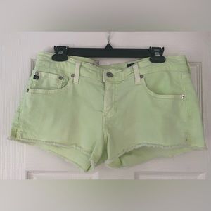 AG low rise denim shorts. Fluorescent green.